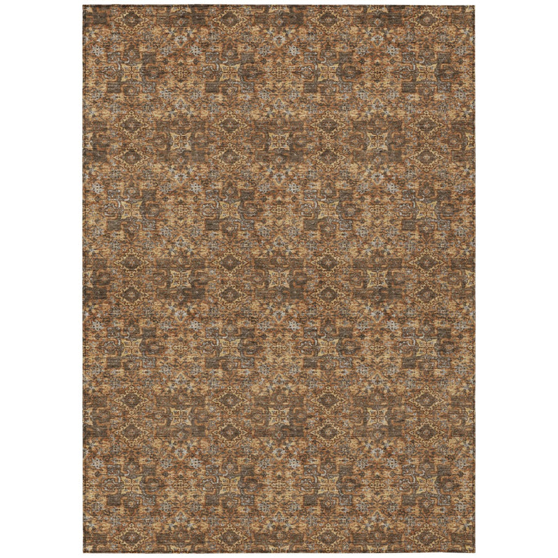 Damask area rug with small repeating motifs in orange-brown and gray accents