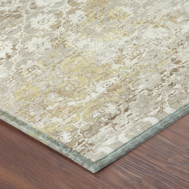 Ivory floral medallion area rug with distressed silver and yellow pattern, corner view