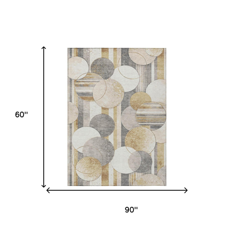 5 ft by 8 ft geometric area rug, abstract circles in cream, gray, and gold