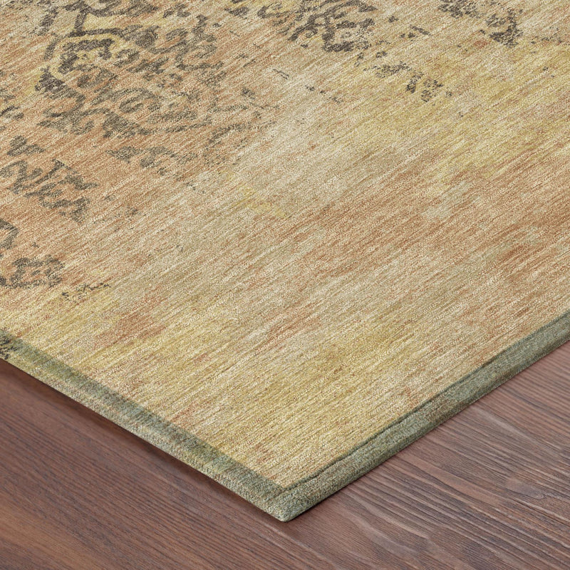 Round rug corner with low-pile texture and stitched border in tan and sage green