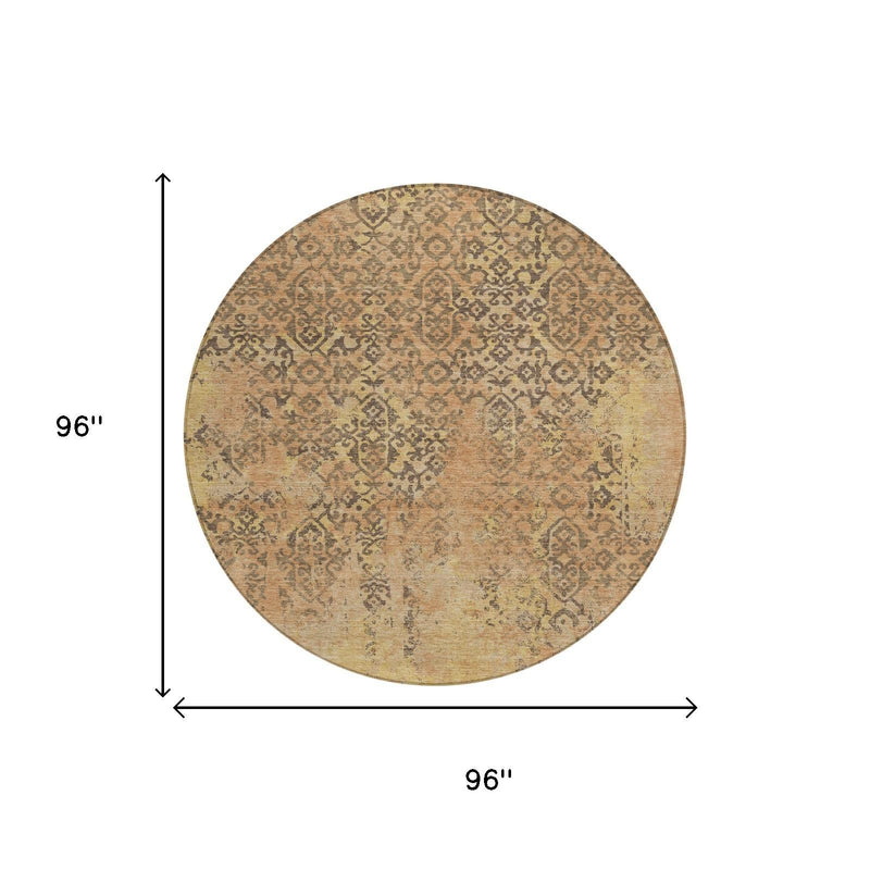 96-inch round rug with distressed abstract pattern in tan and copper tones
