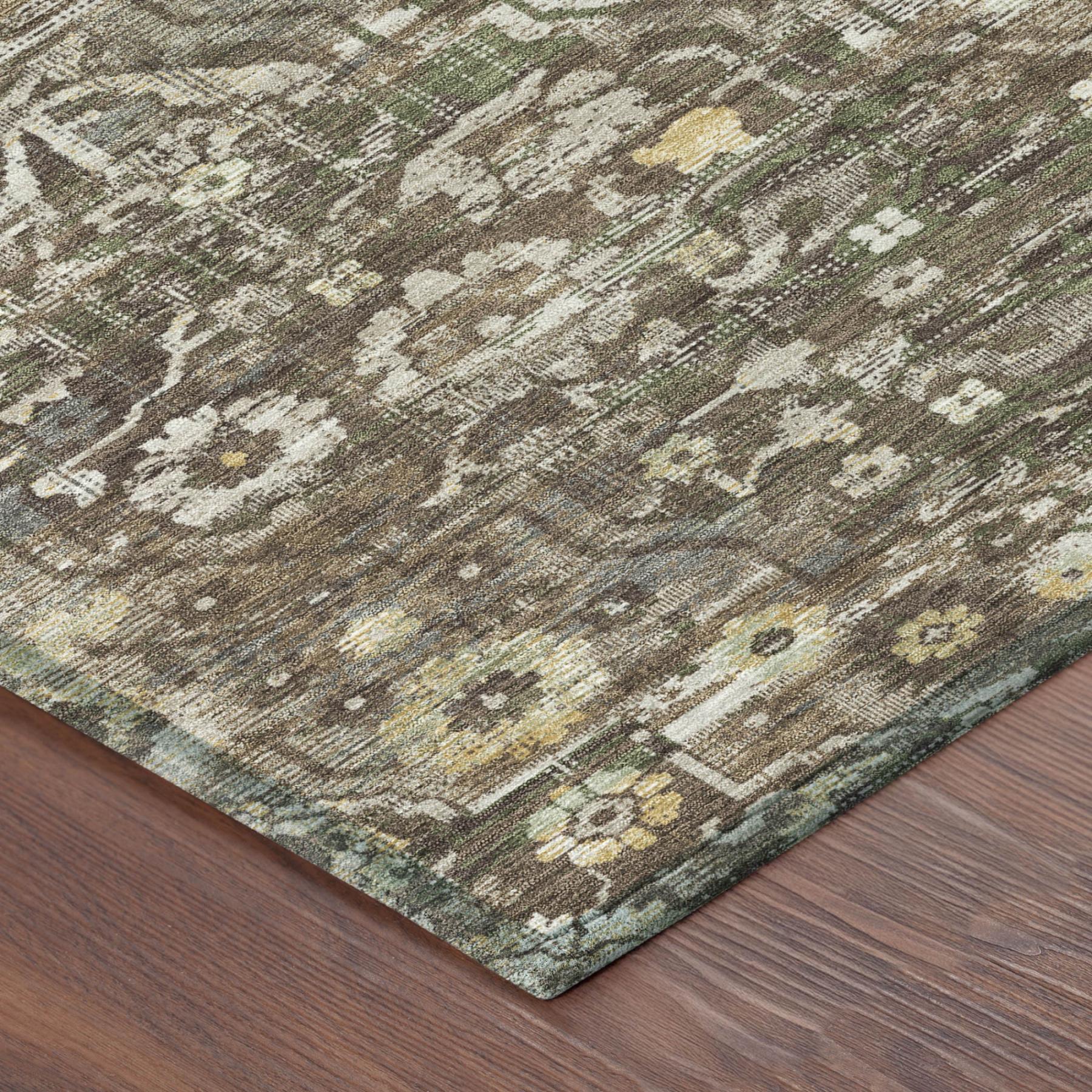 Area rug corner view with distressed medallion floral pattern, brown, green, beige