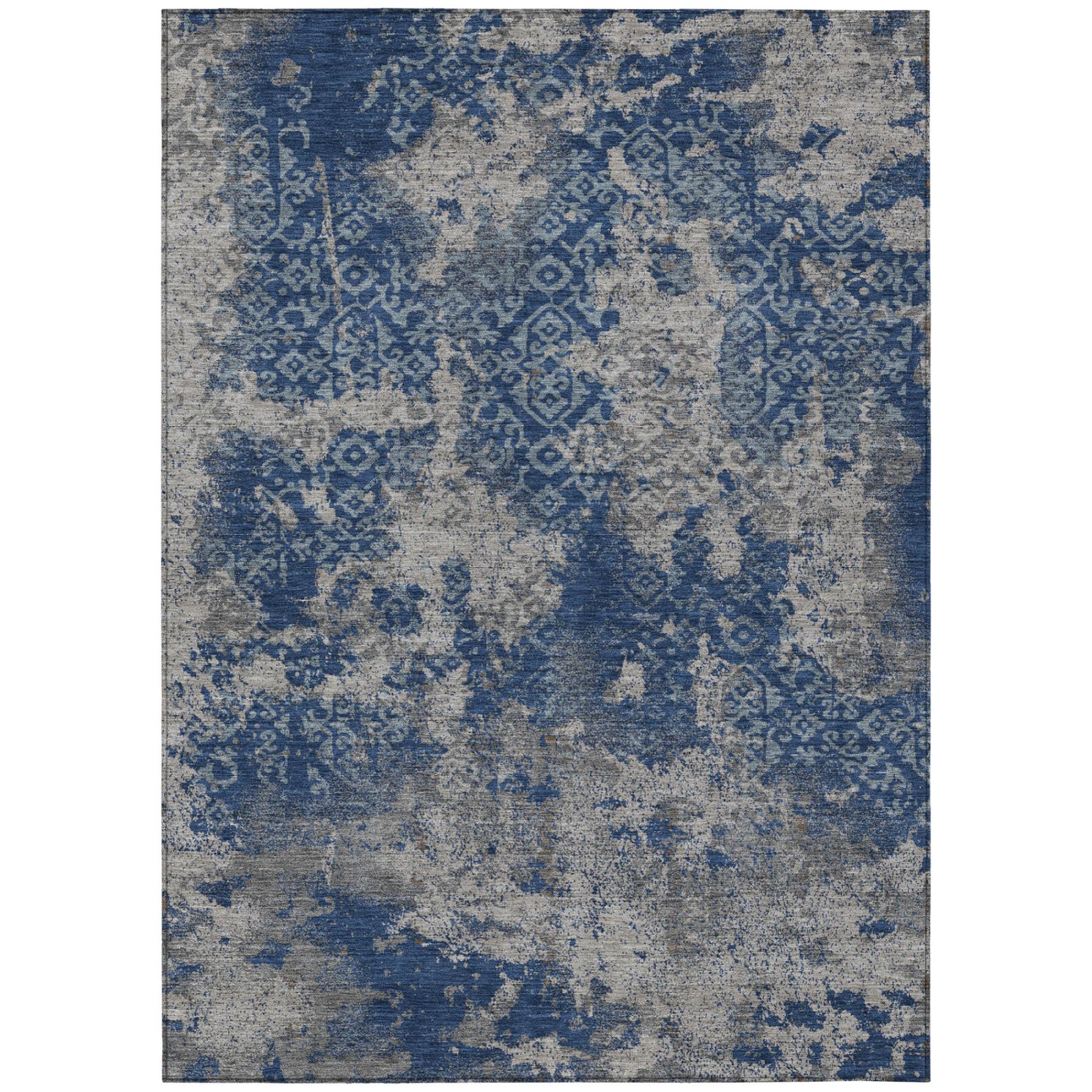 Abstract washable area rug in navy and light blue with distressed wash pattern