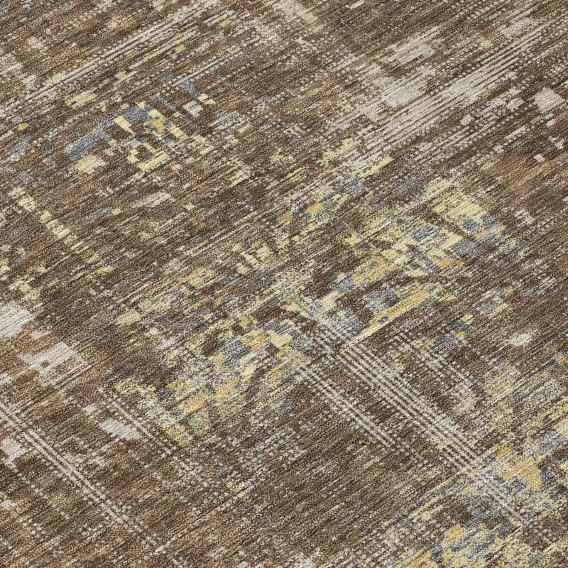 Abstract brown and dark gray washable area rug with distressed pattern