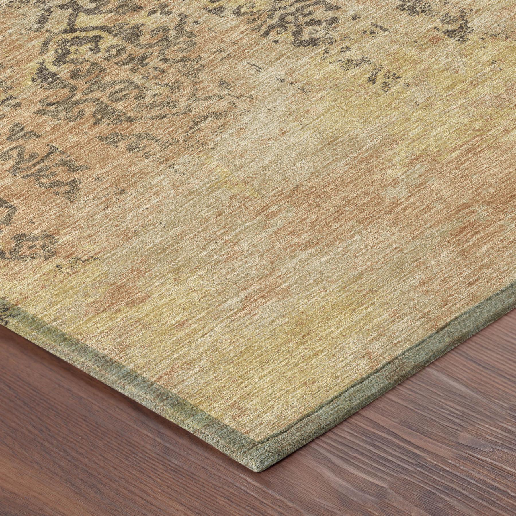 Copper and orange abstract rug corner with textured finish and dark repeating motifs.