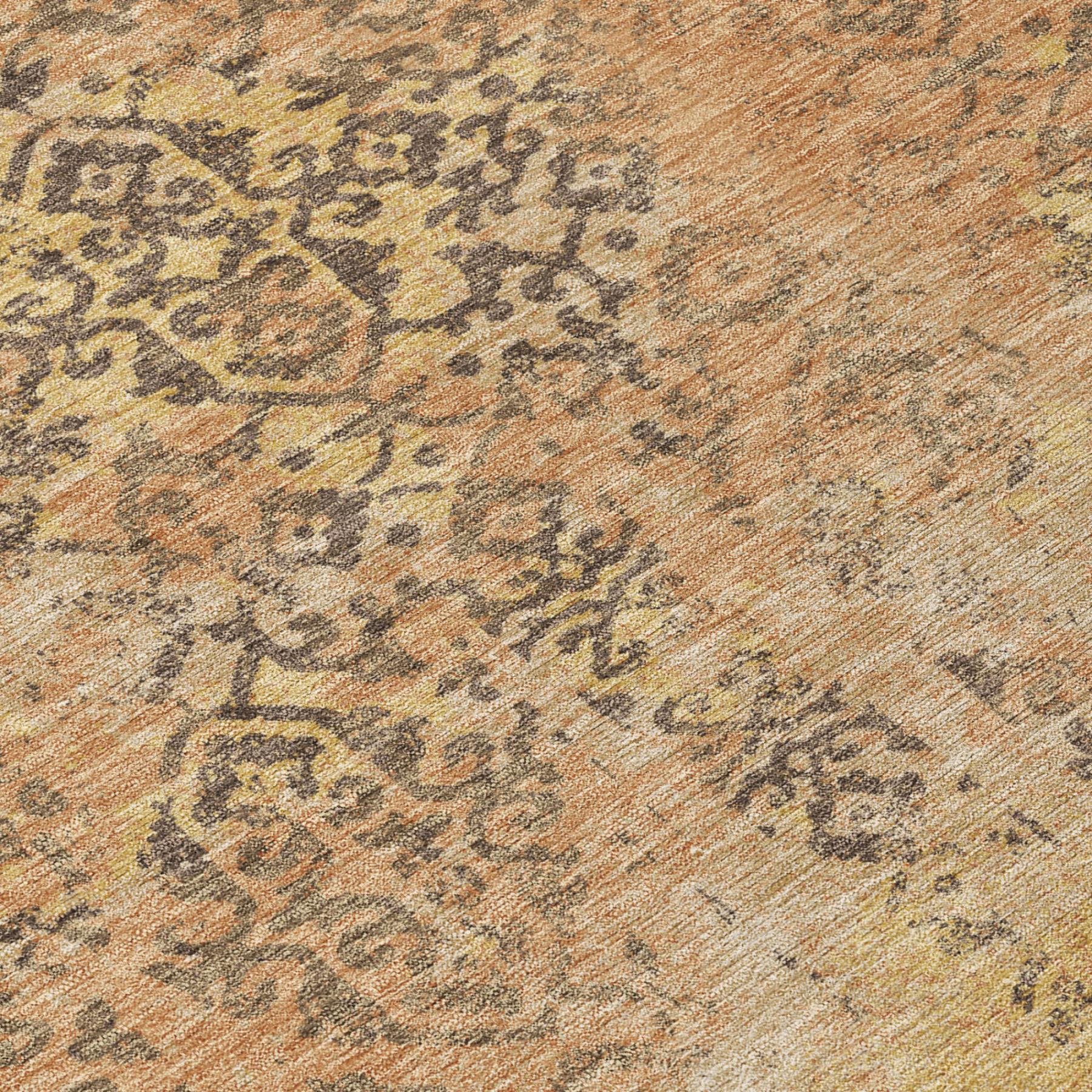 Copper and orange abstract area rug with distressed medallion pattern, textured low pile.