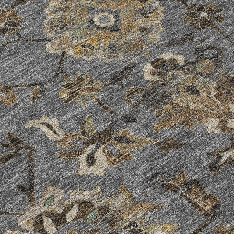 Graphite gray floral medallion area rug close-up, detailed muted gold and blue motifs