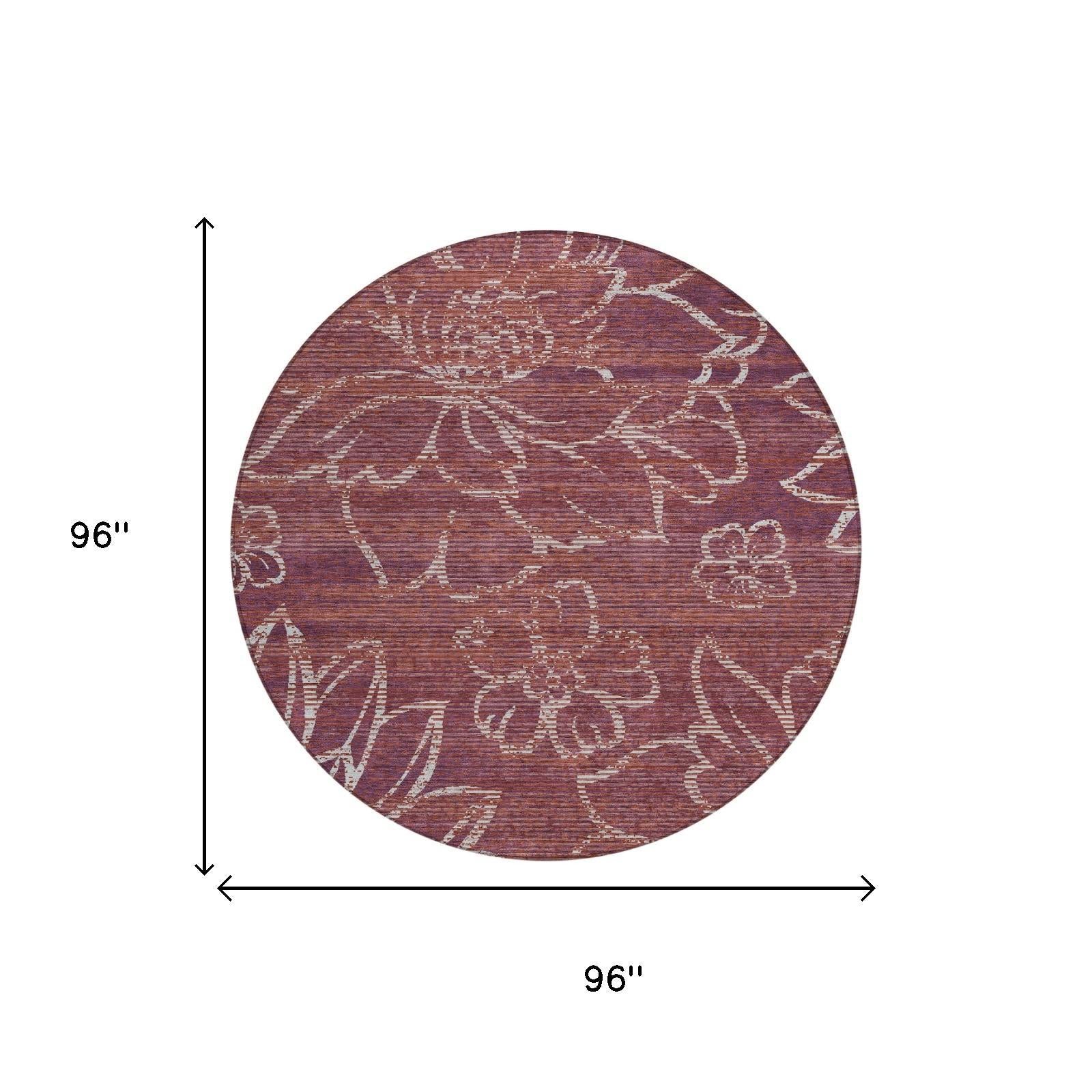 96 in round maroon rug with distressed white floral pattern, washable indoor/outdoor