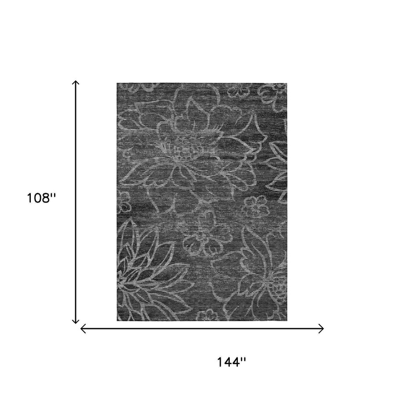 Rectangular area rug, 9 ft x 12 ft, dark graphite floral wash design.