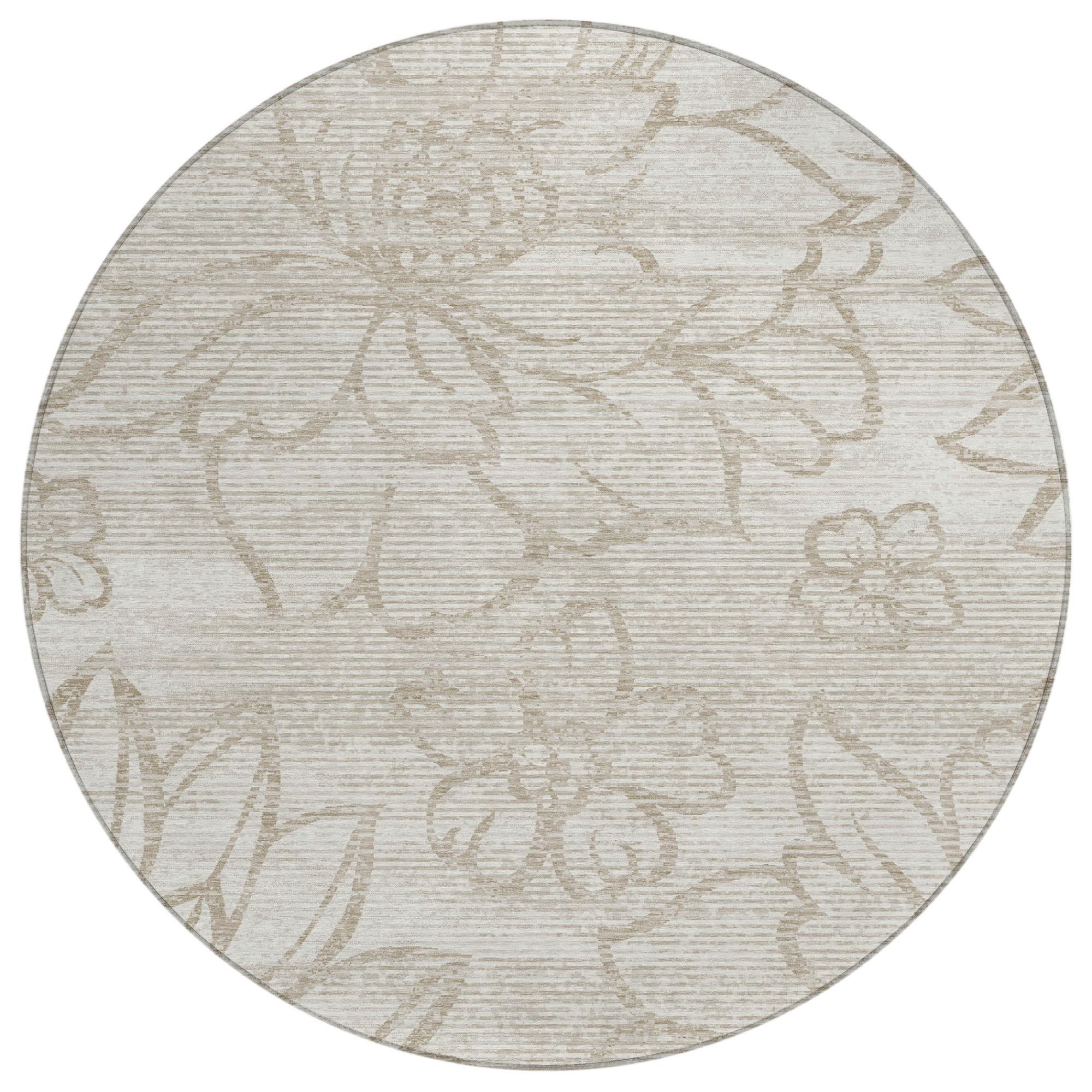 Ivory round area rug with silver-toned floral pattern for indoor or outdoor