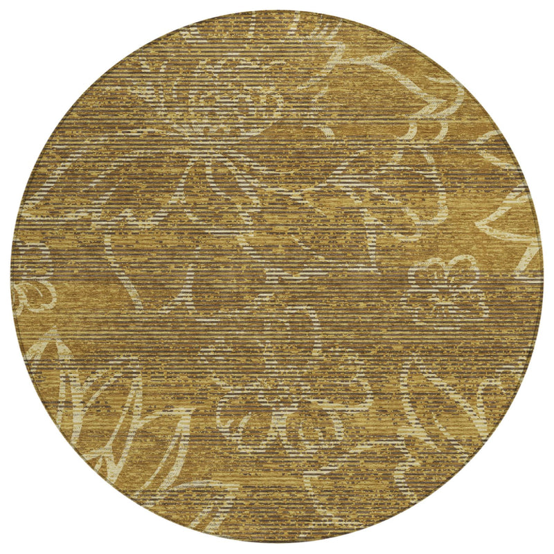 Circular area rug with gold and walnut abstract floral print in cream