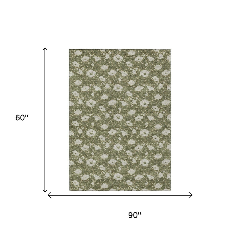Olive green area rug, 60 in x 90 in, distressed white floral medallion pattern