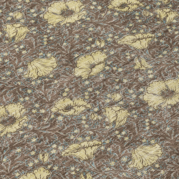 Floral patterned surface of round area rug in brown, coffee, and blue