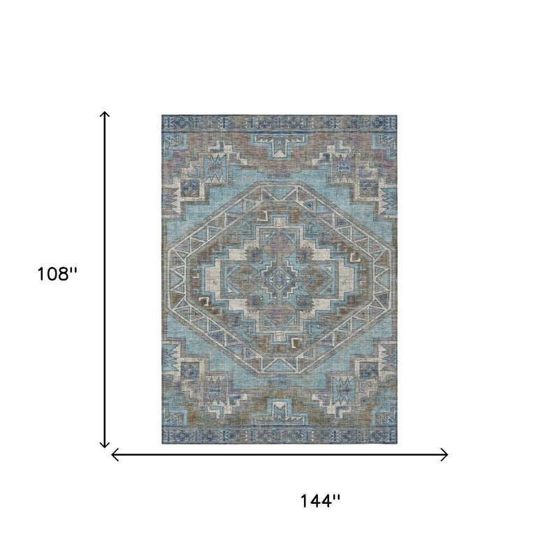 Southwestern area rug with teal blue and gray geometric pattern, rectangular layout