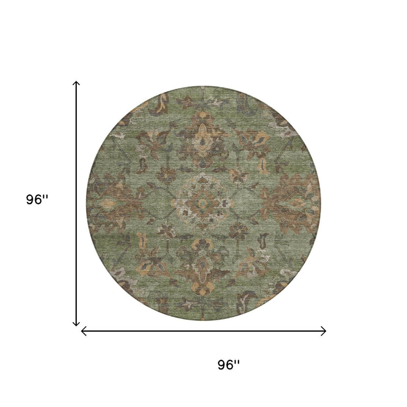 96-inch round area rug in olive green with distressed floral medallion pattern
