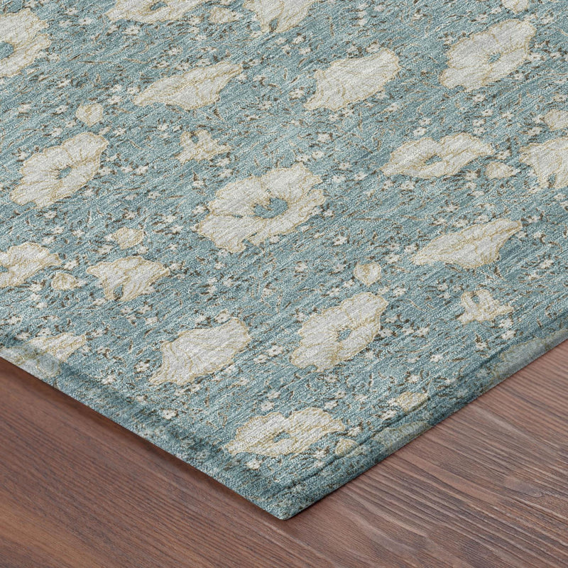 Teal blue rug corner with distressed pewter floral medallion texture