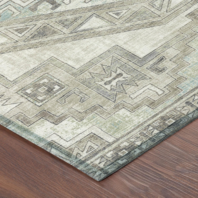 Rug corner close-up with Southwestern geometric lines in ivory and pewter, subtle blue-gray
