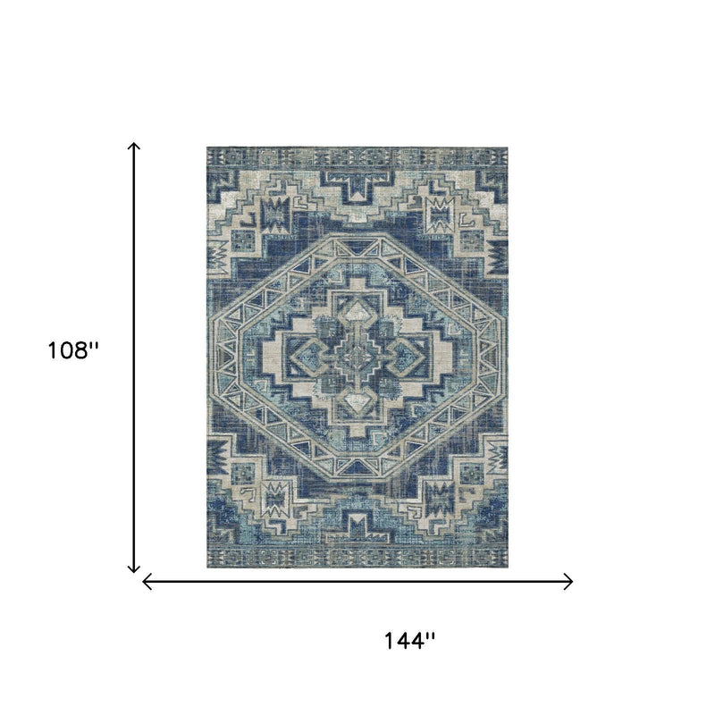Blue southwestern area rug with central diamond medallion and geometric border