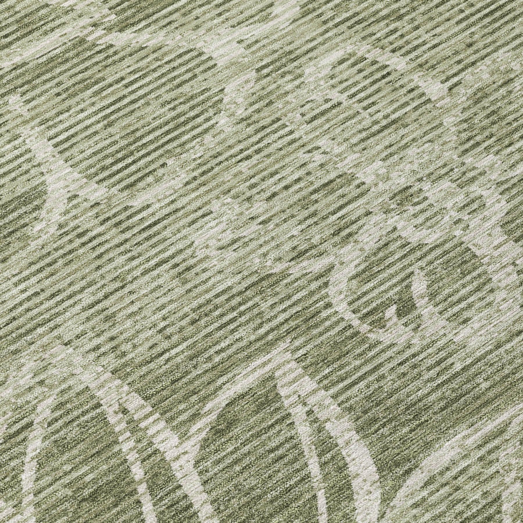 Close-up of olive green rug with cream floral print and linen-like texture