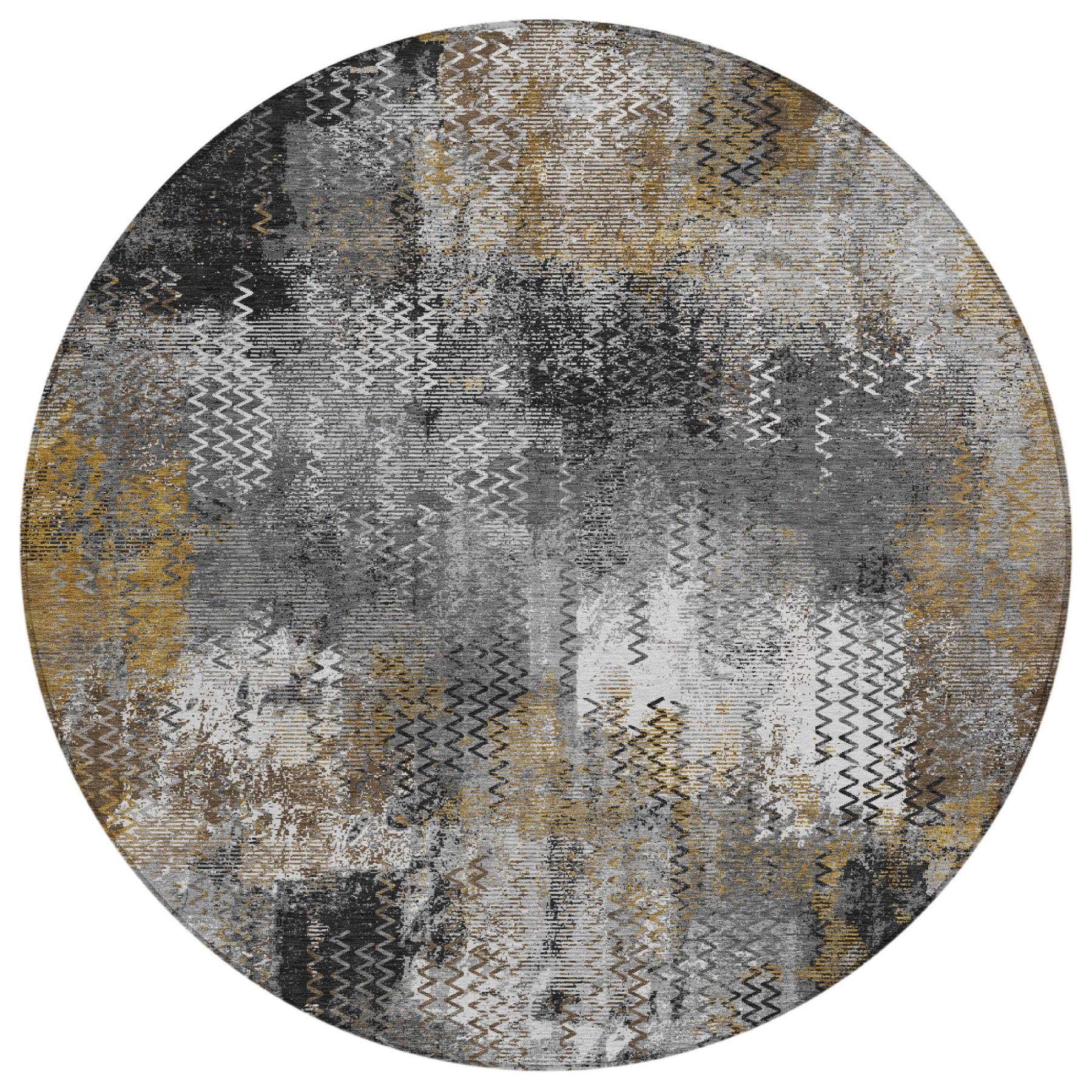 Round abstract area rug with gray, graphite, cream, and mustard patchwork texture