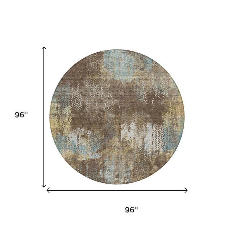 Round abstract area rug, brown and blue with zigzag and distressed motif