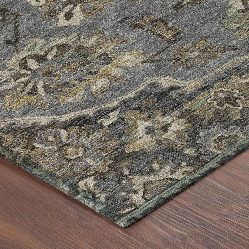 Corner of graphite and gray floral medallion area rug with detailed border