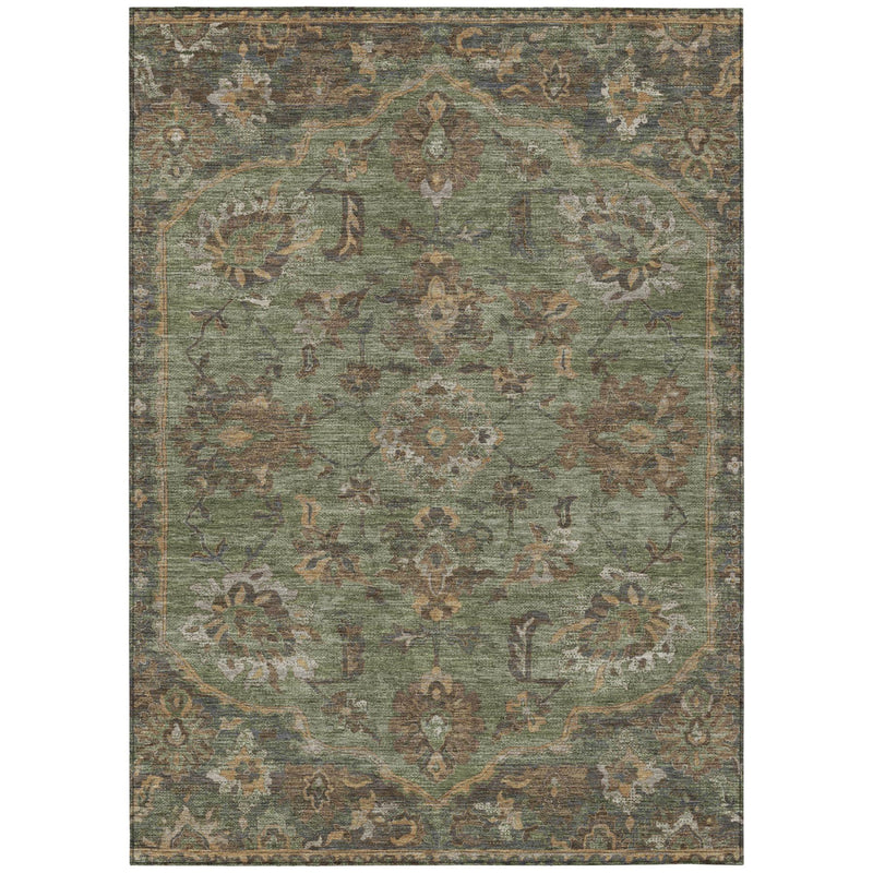 Olive green area rug with distressed green floral medallion motif, rectangular design.