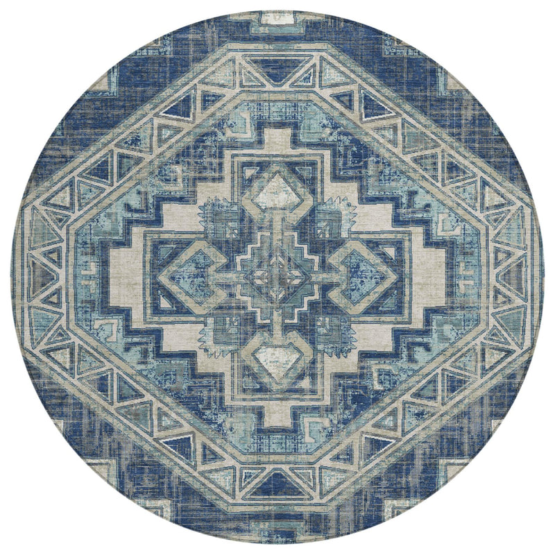 Round area rug with central star-like motif and Southwestern border in navy and light blue
