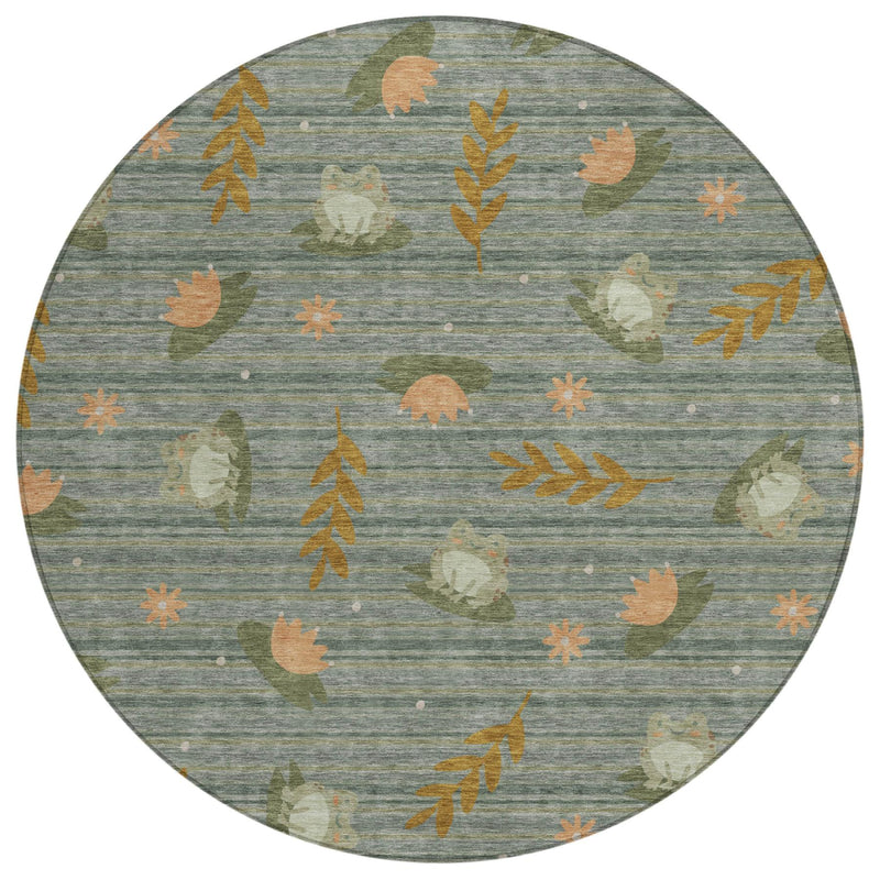 Round area rug with botanical leaves and muted orange and green accents