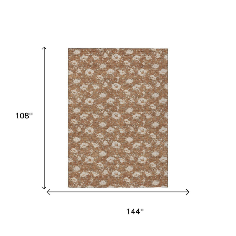 Rust and orange area rug with floral pattern, 108 x 144 in dimensions