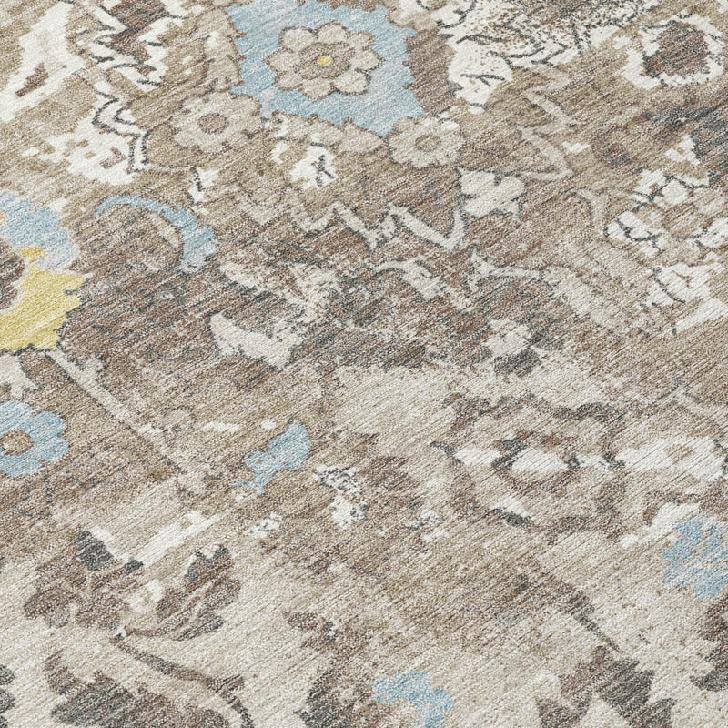 Close-up floral pattern area rug in ivory and pewter with light blue and yellow details