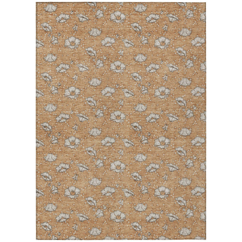 Copper orange area rug with scattered light gray floral motifs and subtle border
