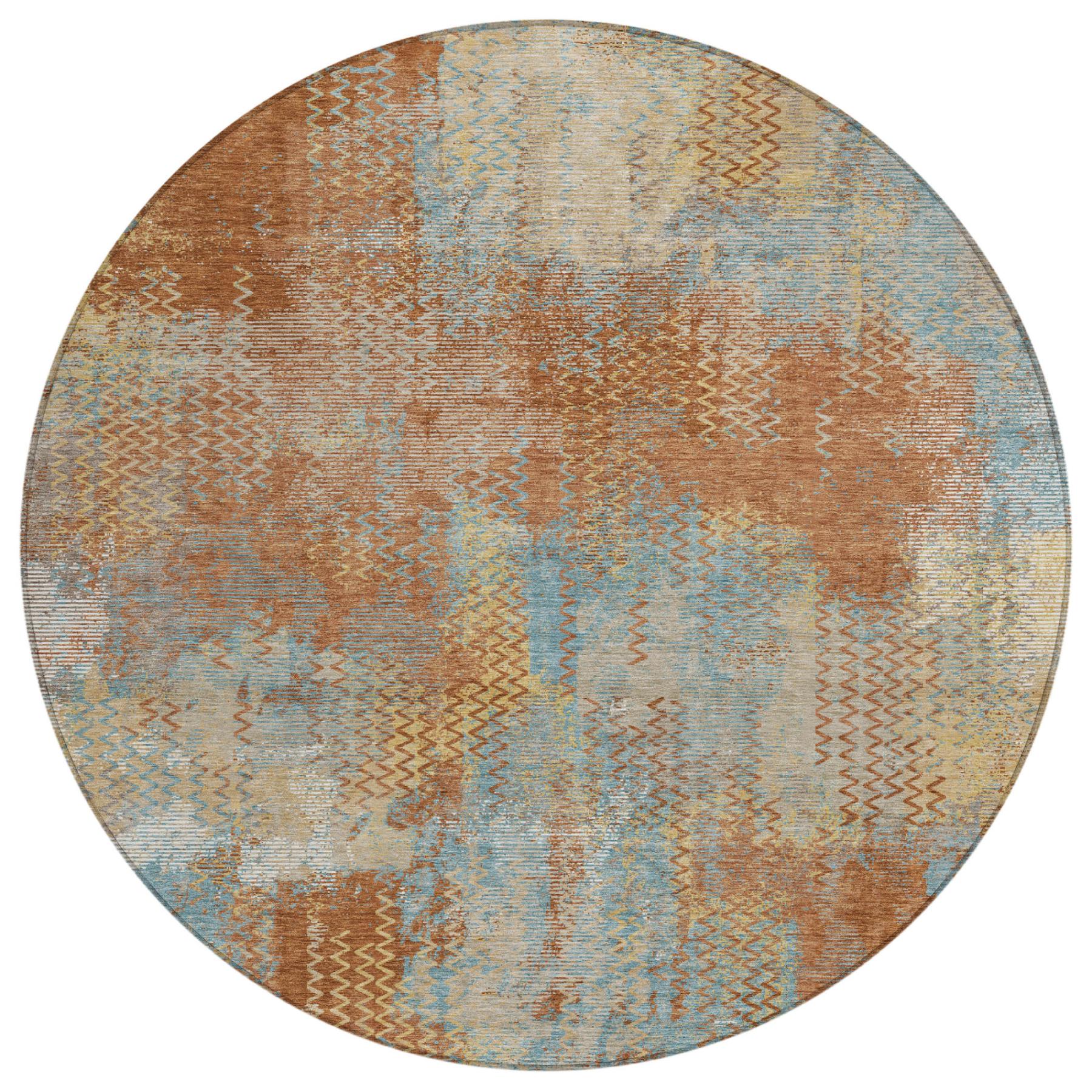 Round washable area rug with abstract chevron pattern in rust orange and light blue.
