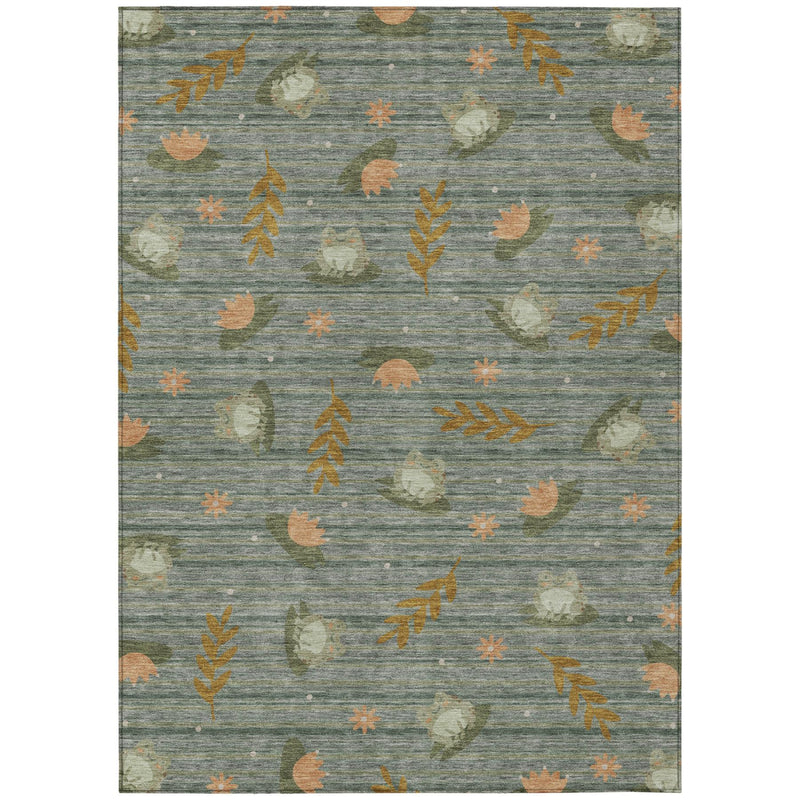 Rectangular green area rug with repeating botanical leaves in tan, orange, and sage tones
