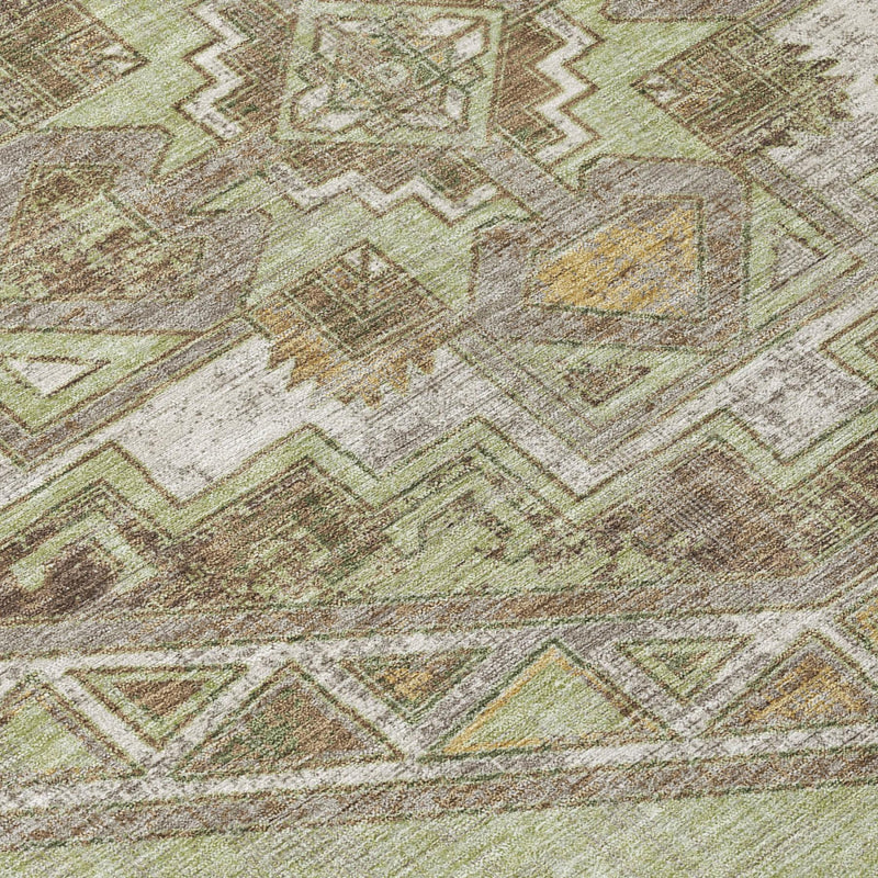 Close-up of green, beige, and brown southwestern geometric area rug texture