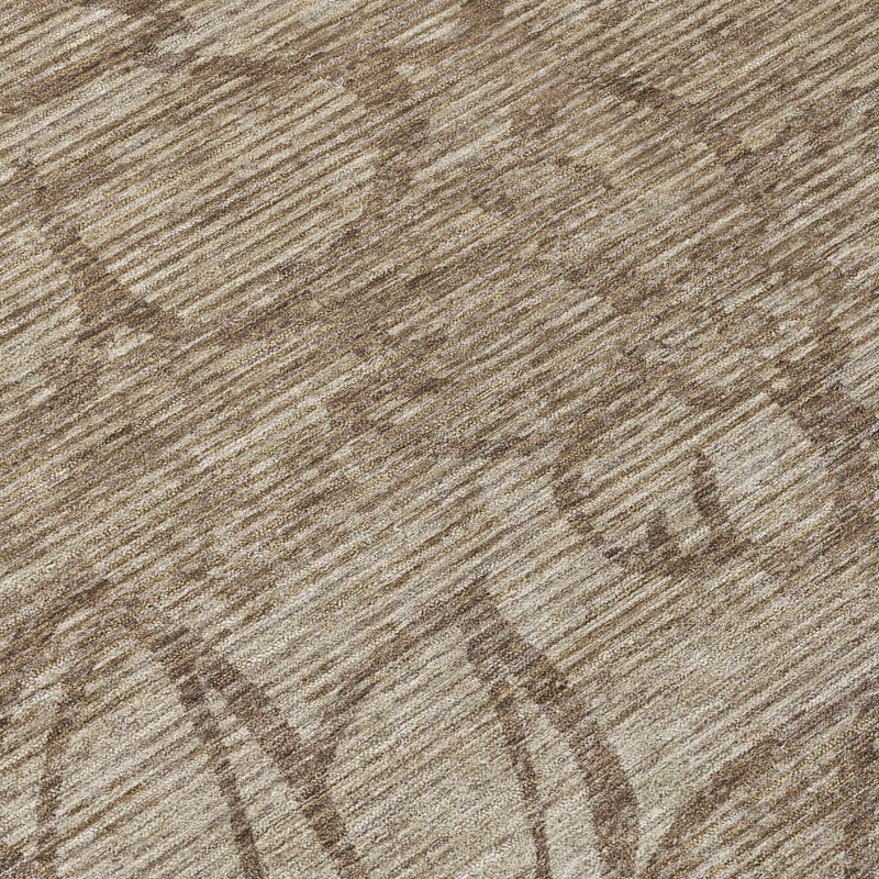 Beige and brown floral rug close-up, textured weave surface