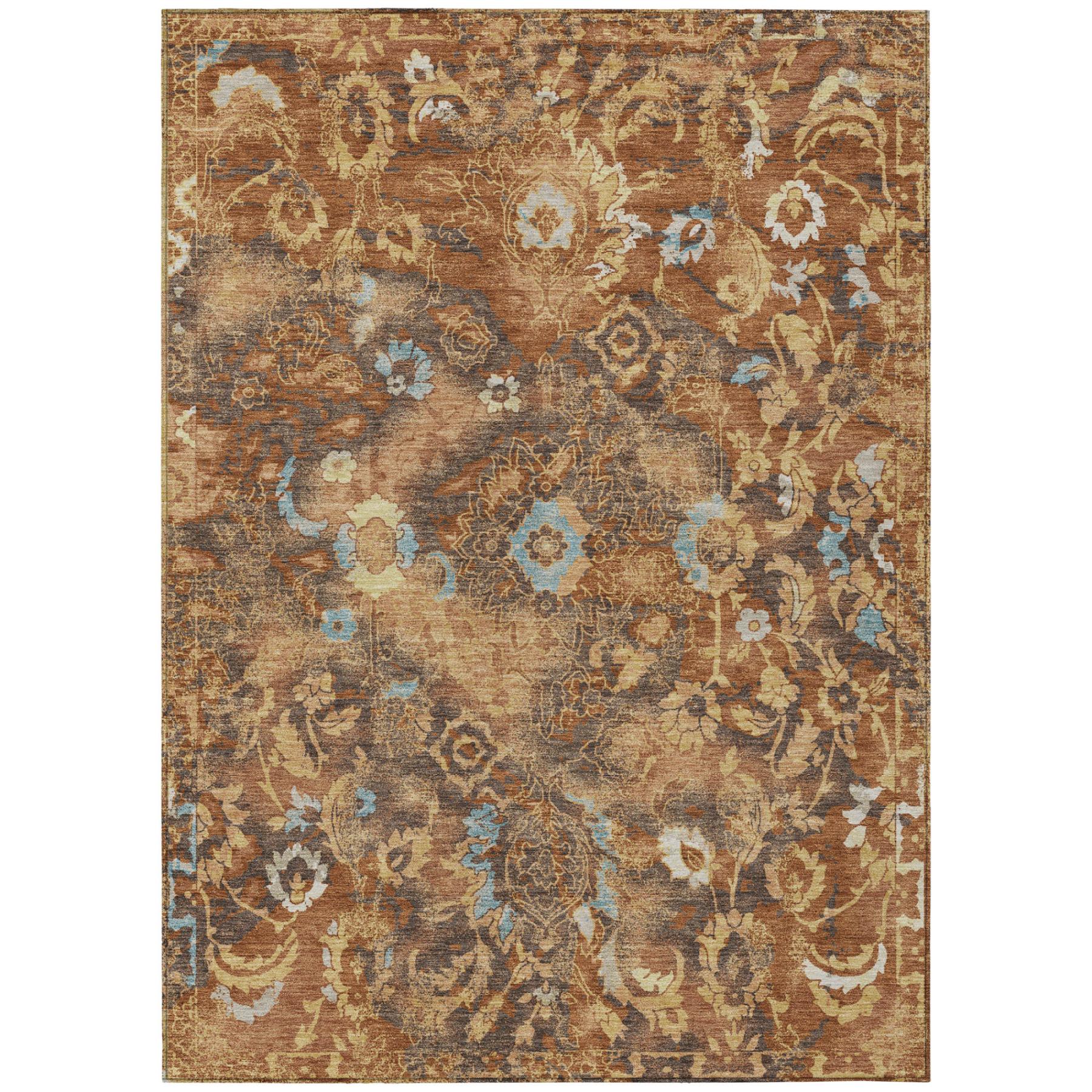 Rectangular floral area rug with distressed orange, rust, and blue pattern