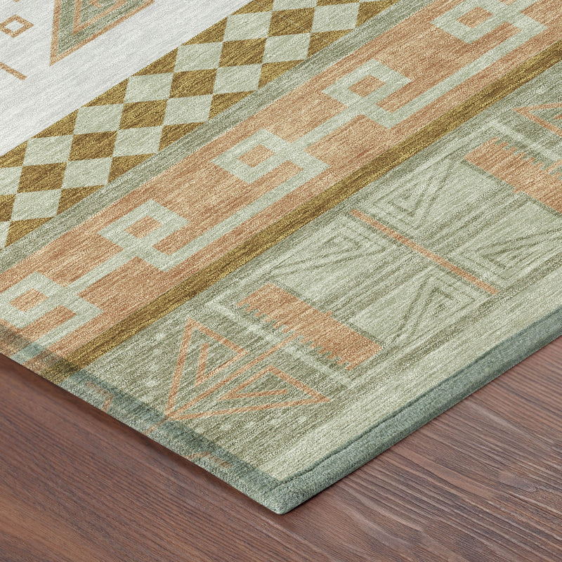 Corner view of green and teal tribal area rug with checkered band and orange accents