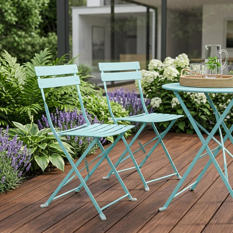 Aqua blue aluminum folding dining chairs with slatted seats and backs on outdoor patio
