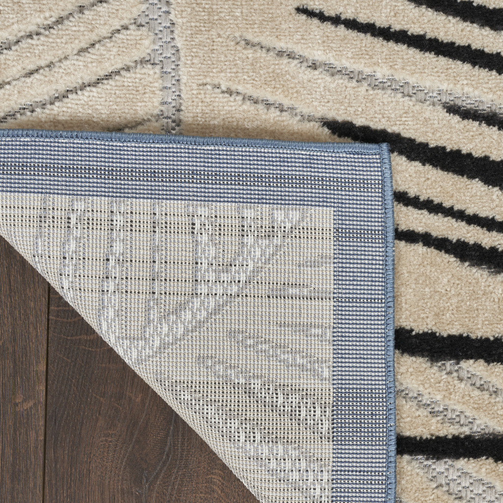 5' X 7' Navy Blue Ivory And Black Palm Leaf Indoor Outdoor Area Rug - Outdoor