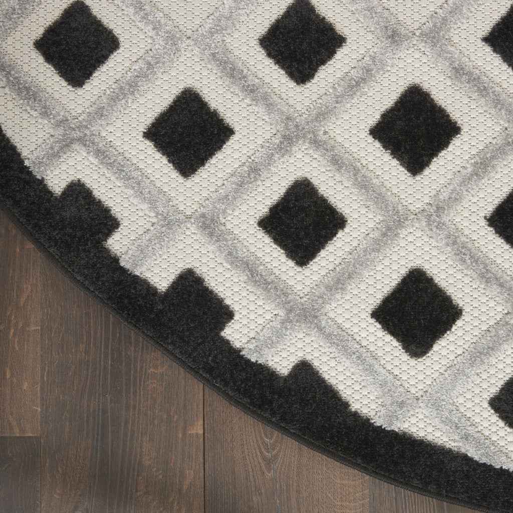 4' Black And White Round Indoor Outdoor Area Rug