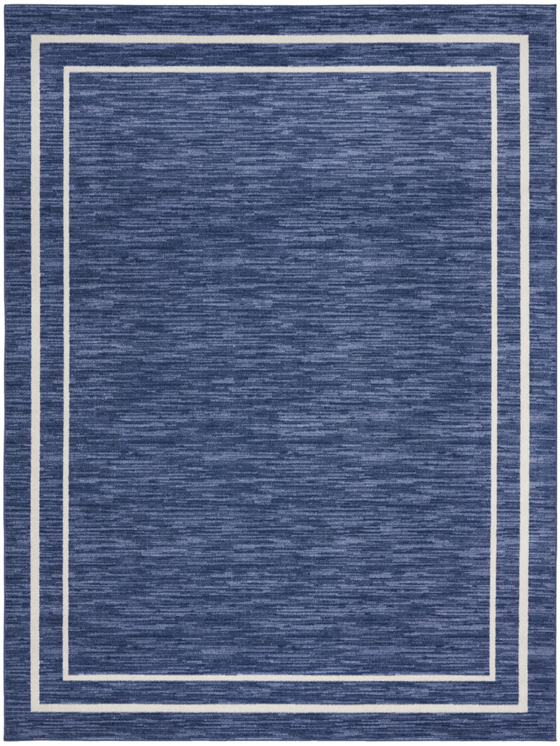 Navy and ivory area rug design with stacked squares and thin ivory frame