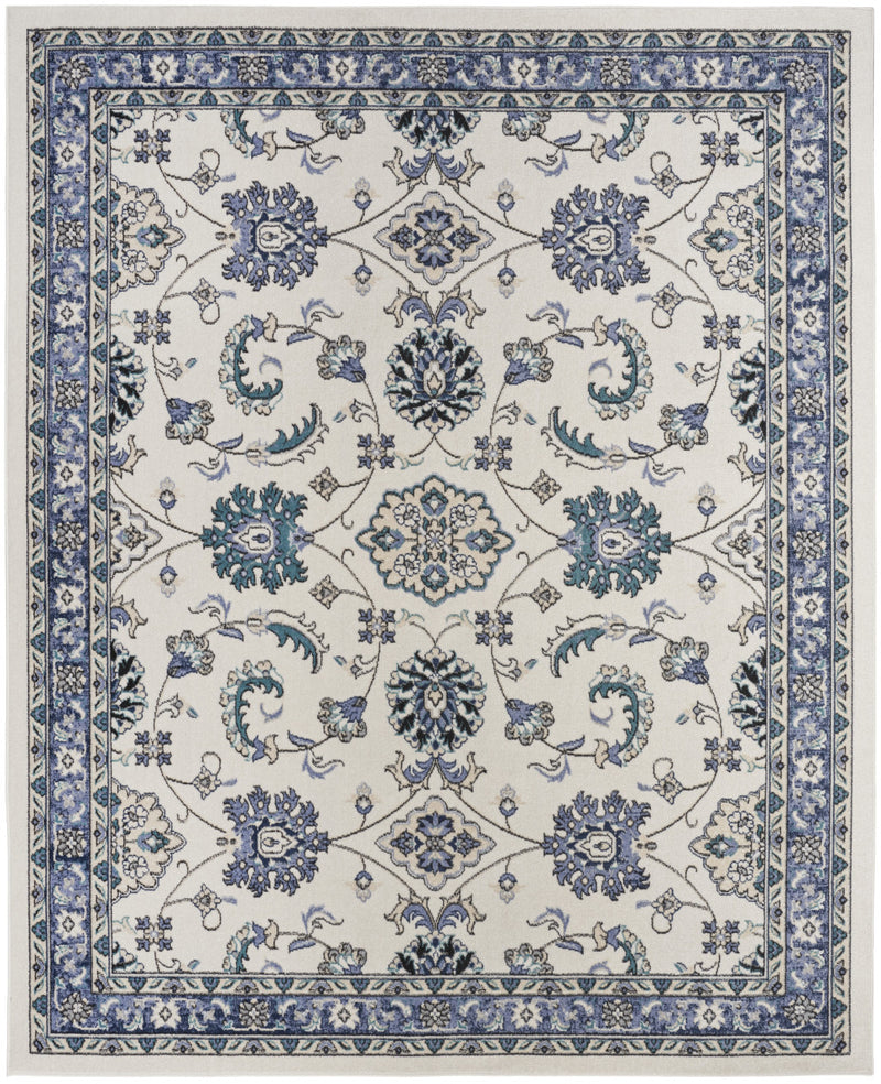 Ivory and blue ornate floral area rug with symmetrical border design