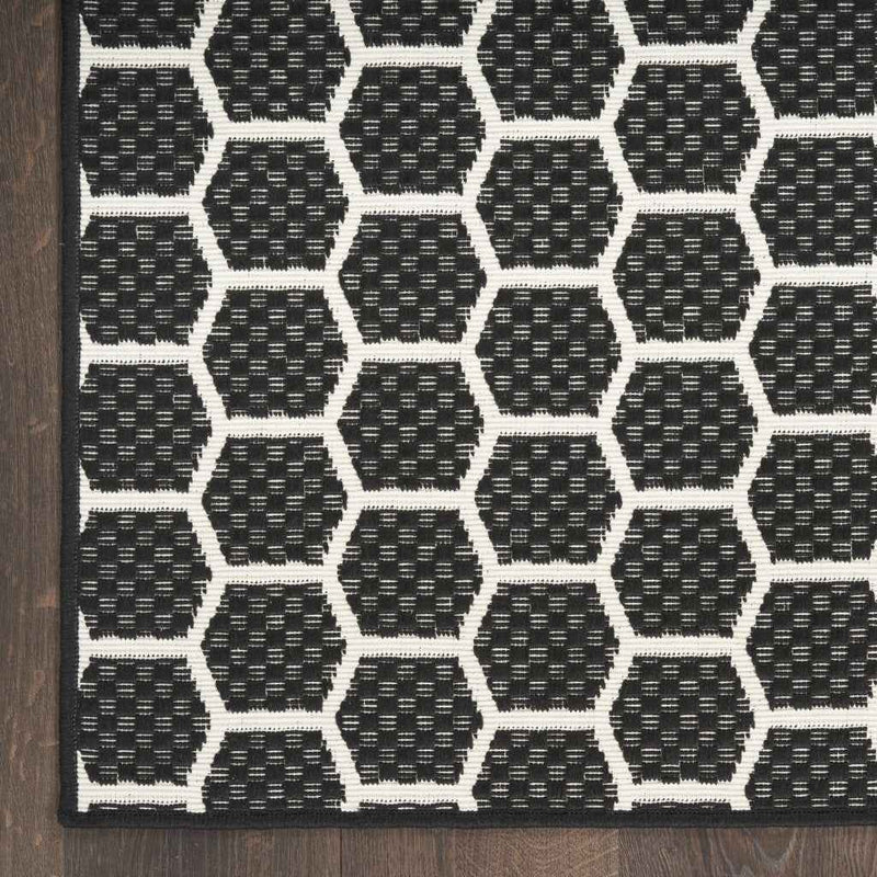 9' X 12' Black And Ivory Geometric Indoor Outdoor Area Rug