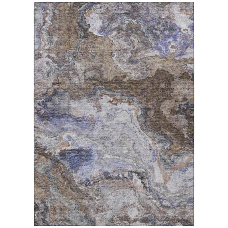 Rectangular abstract area rug with blue, gray, and tan mottled abstract design