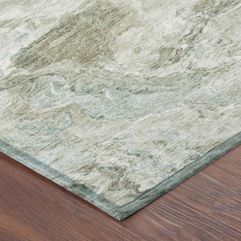 Abstract area rug corner, beige with muted green and blue tones, low pile