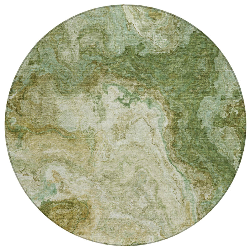 Round abstract rug with swirl-like pattern in green, cream, and brownish tan