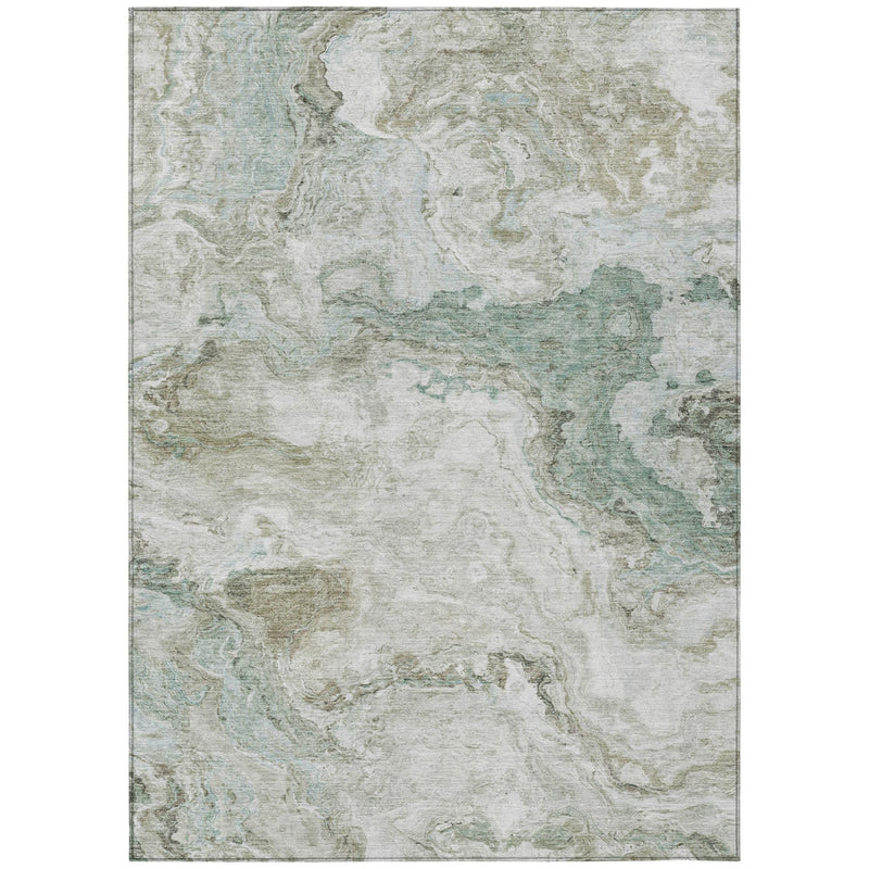 Top view of beige and green abstract area rug with distressed mottled pattern