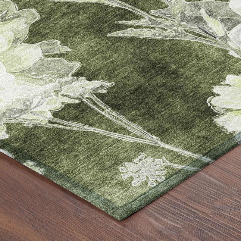 Green floral area rug corner with white flower pattern and light-green highlights