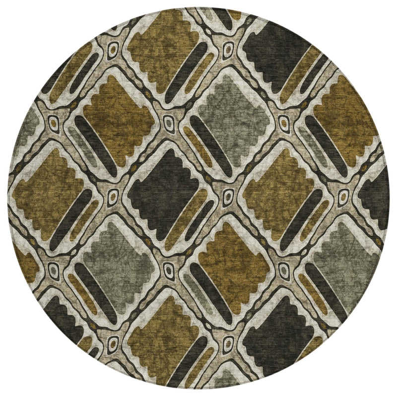 Close-up round rug with interlocking geometric shapes in olive, tan, and dark gray